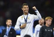 CARDIFF, WALES - JUNE 03:  Cristiano Ronaldo of Real Madrid celebrates with his winners medal after victory in the UEFA Champions League Final between Juventus and Real Madrid at National Stadium of Wales on June 3, 2017 in Cardiff, Wales.  (Photo by Laurence Griffiths/Getty Images)